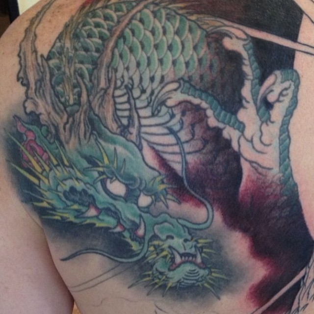 In progress dragon tattoo by Jason Kundell