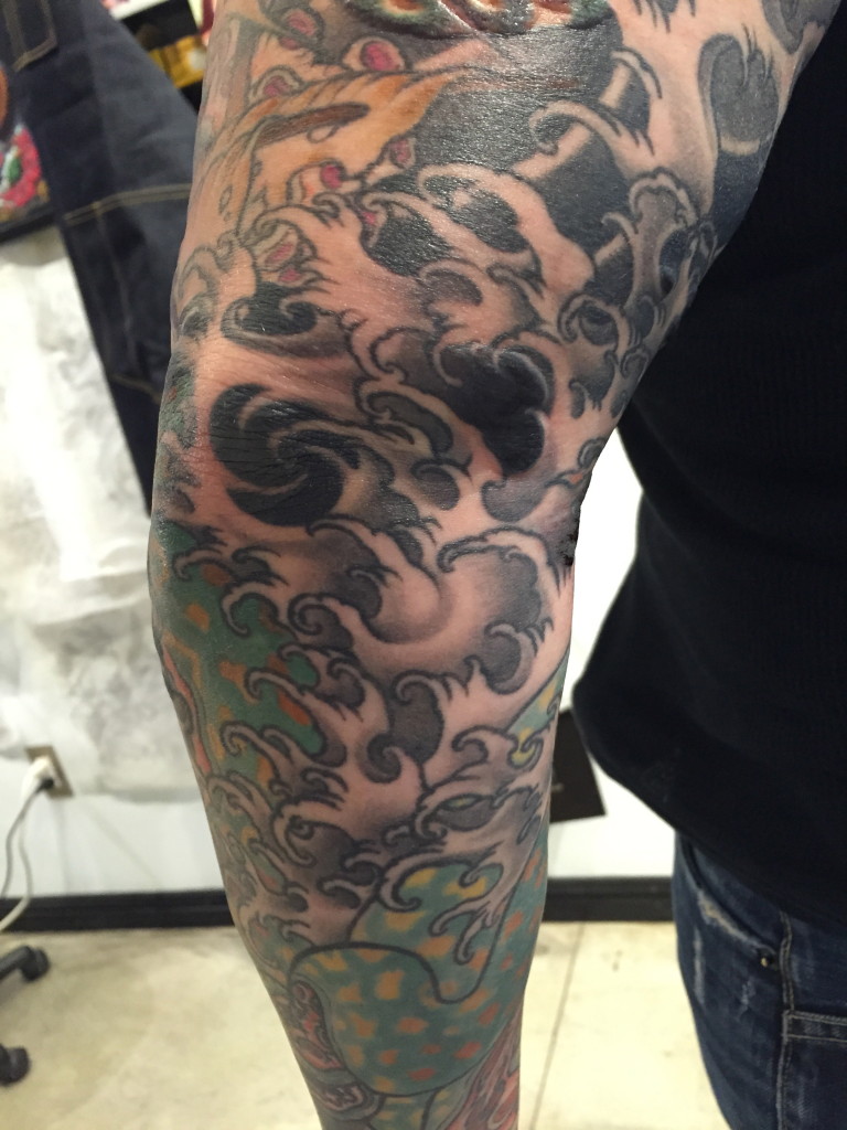 Sleeve detail by Jason Kundell
